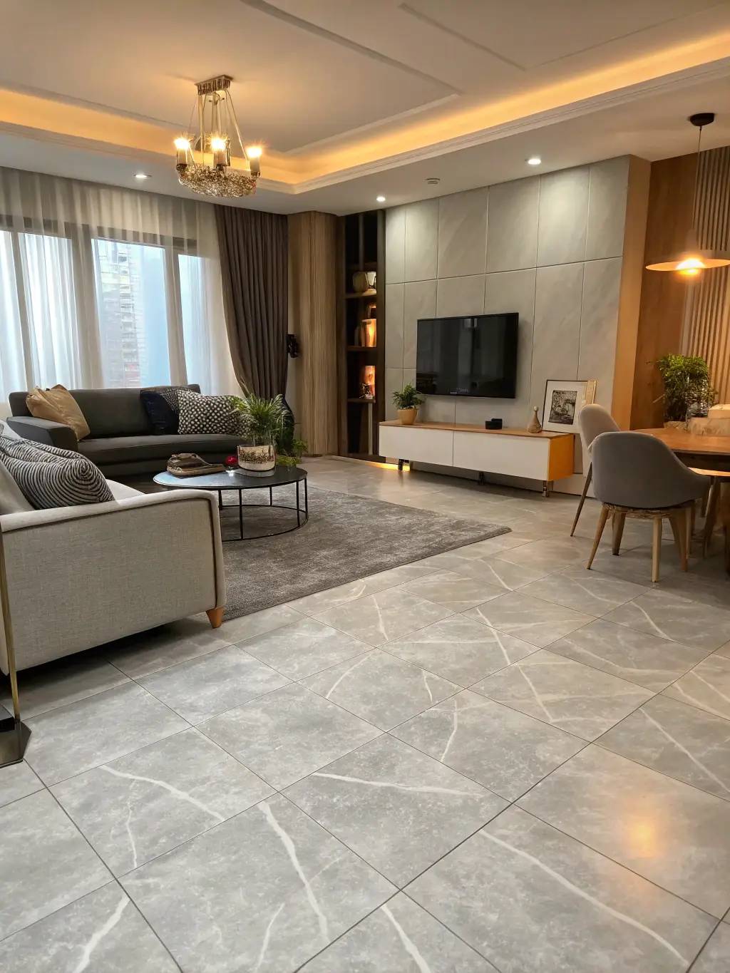 A high-resolution image showcasing a living room floor elegantly tiled with digital vitrified tiles, highlighting the seamless finish and modern design.